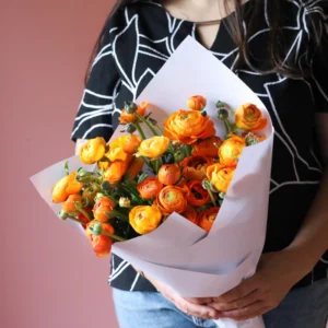 Orange ranunculus flower bouquet.