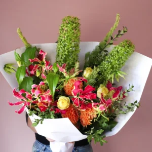 Product image: Colourful flower bouquet with pineapple lilies, gloriosa lilies, dahlias and roses