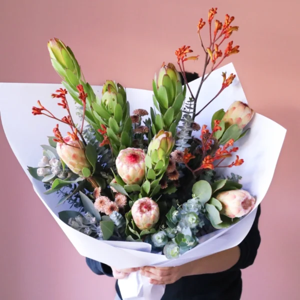 Bouquet of native flowers including kangaroo paw, proteas and leucadendrons.